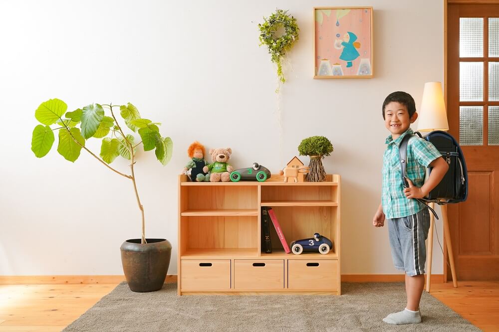 Various shelves of toys and tools