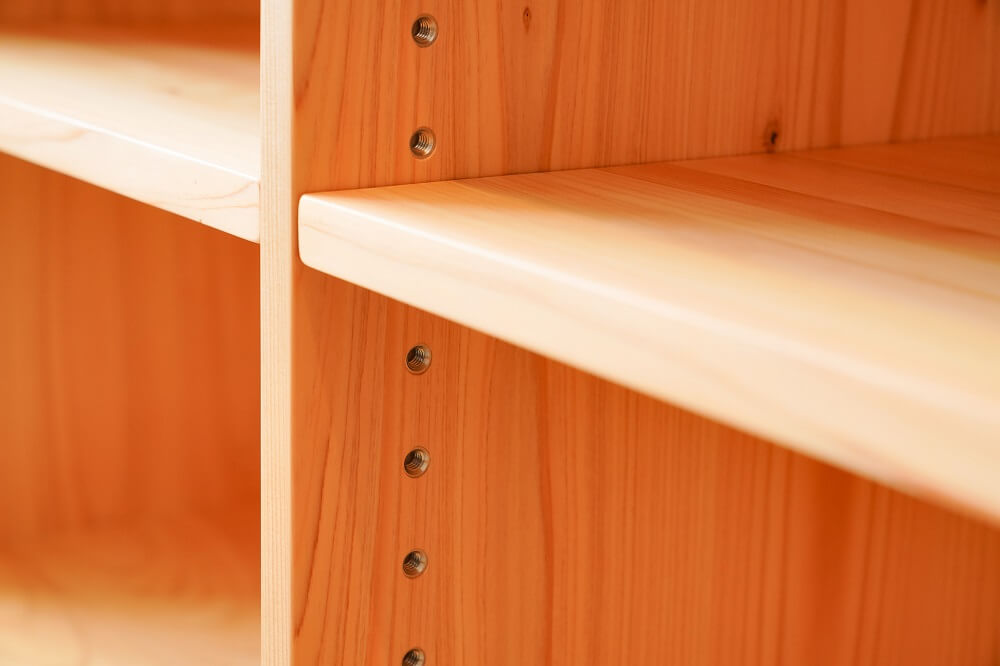 Various shelves of toys and tools